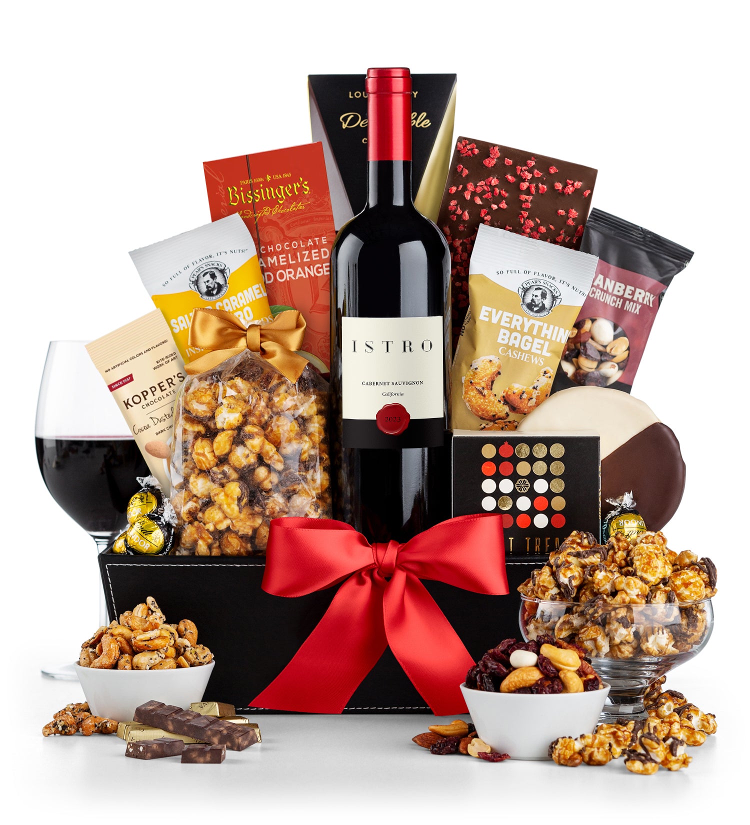 5th Avenue Classic basket with wine, snacks, and chocolates on a white background.