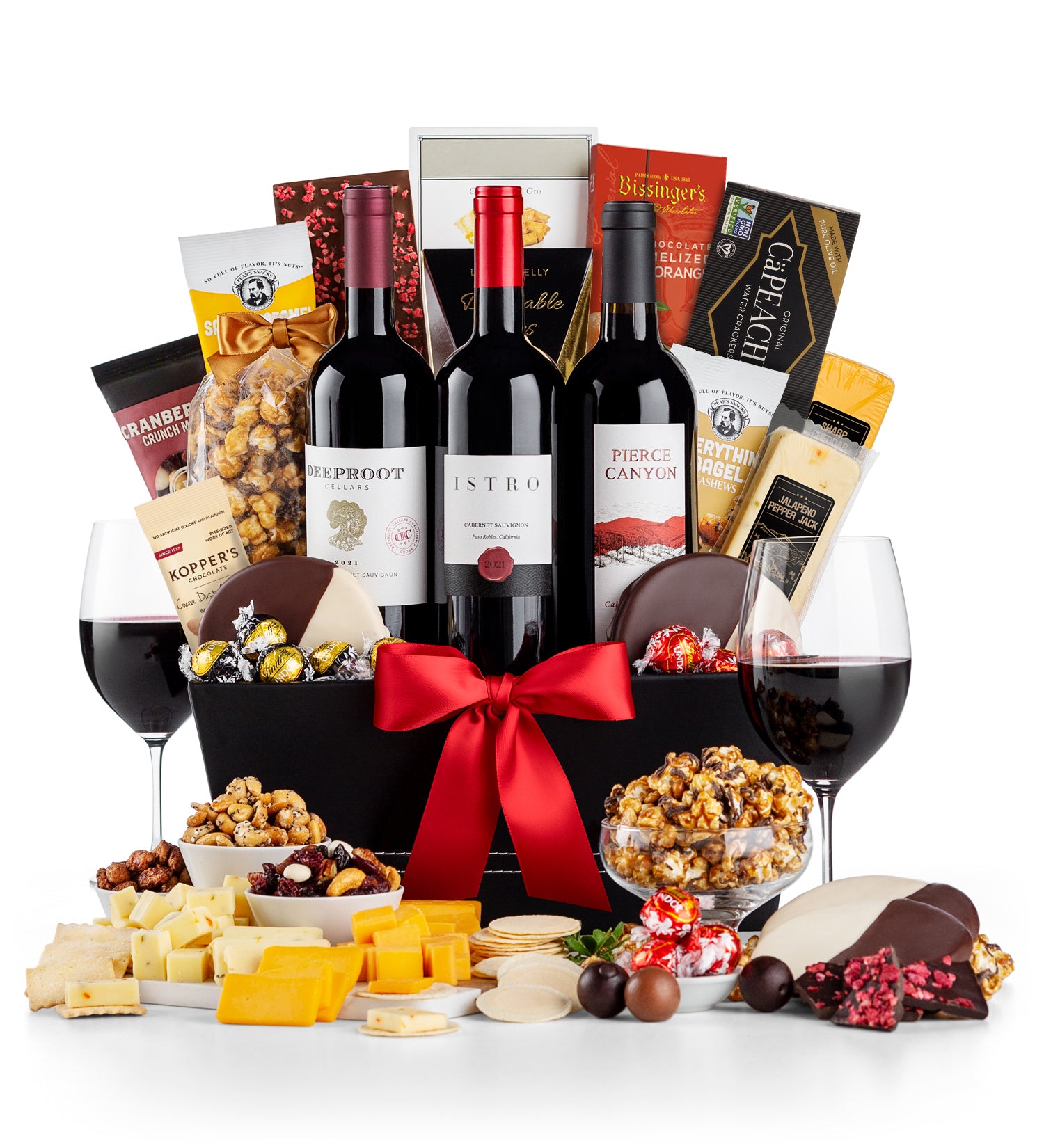 5th Avenue Supreme gift basket with wine, snacks, and chocolates on a white background