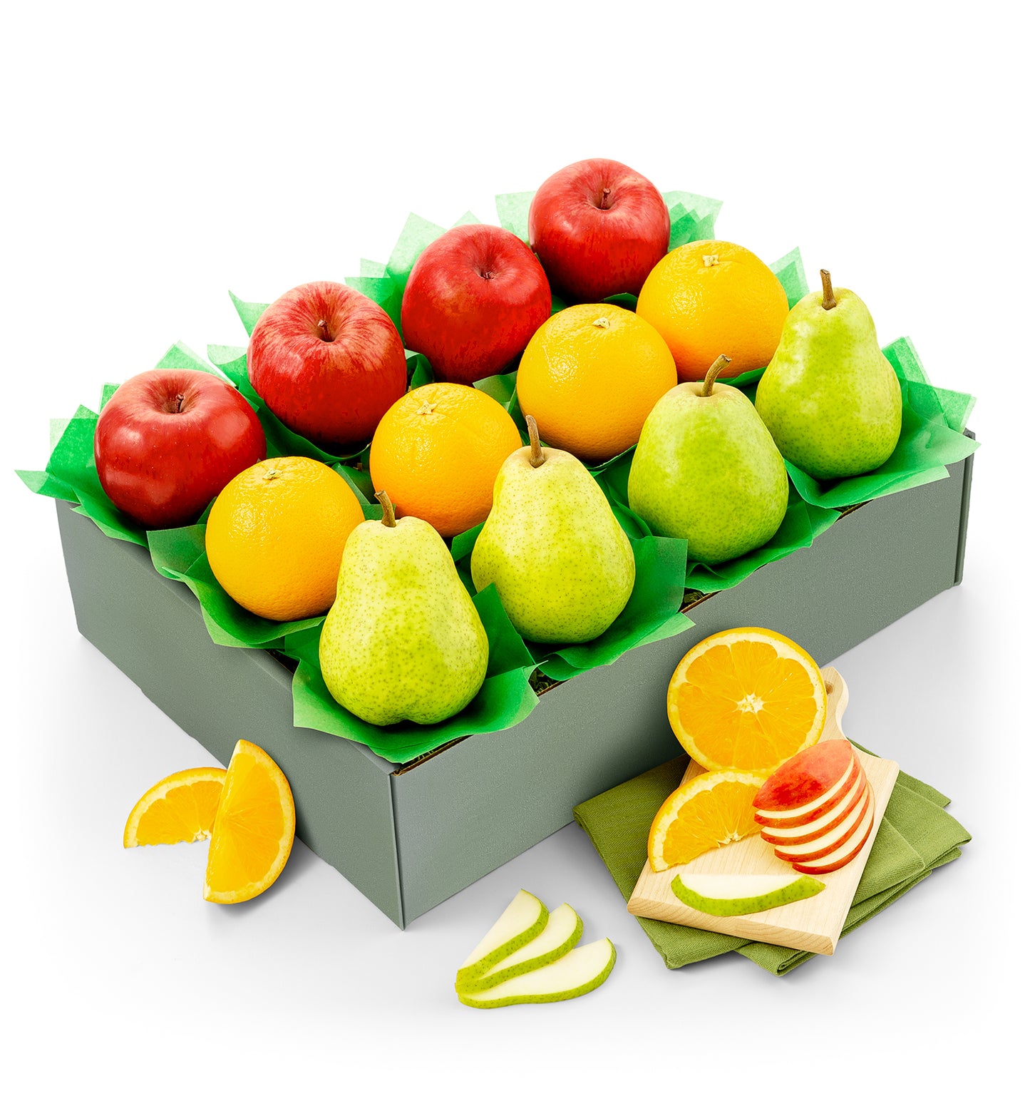 Fruit box with apples, pears, and oranges on a white background