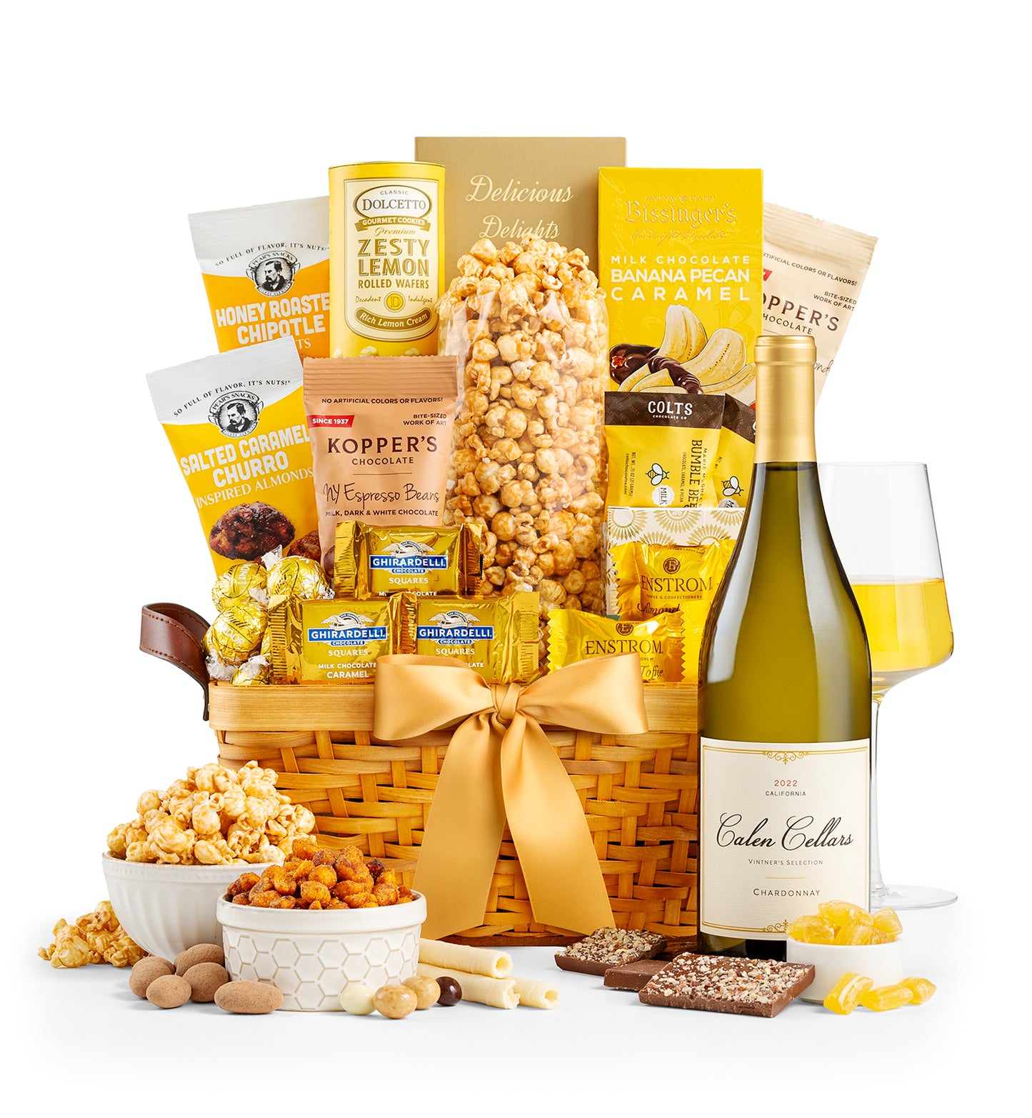 Gourmet gift basket with snacks, a bottle Calen Cellars Chardonnay, on a white background