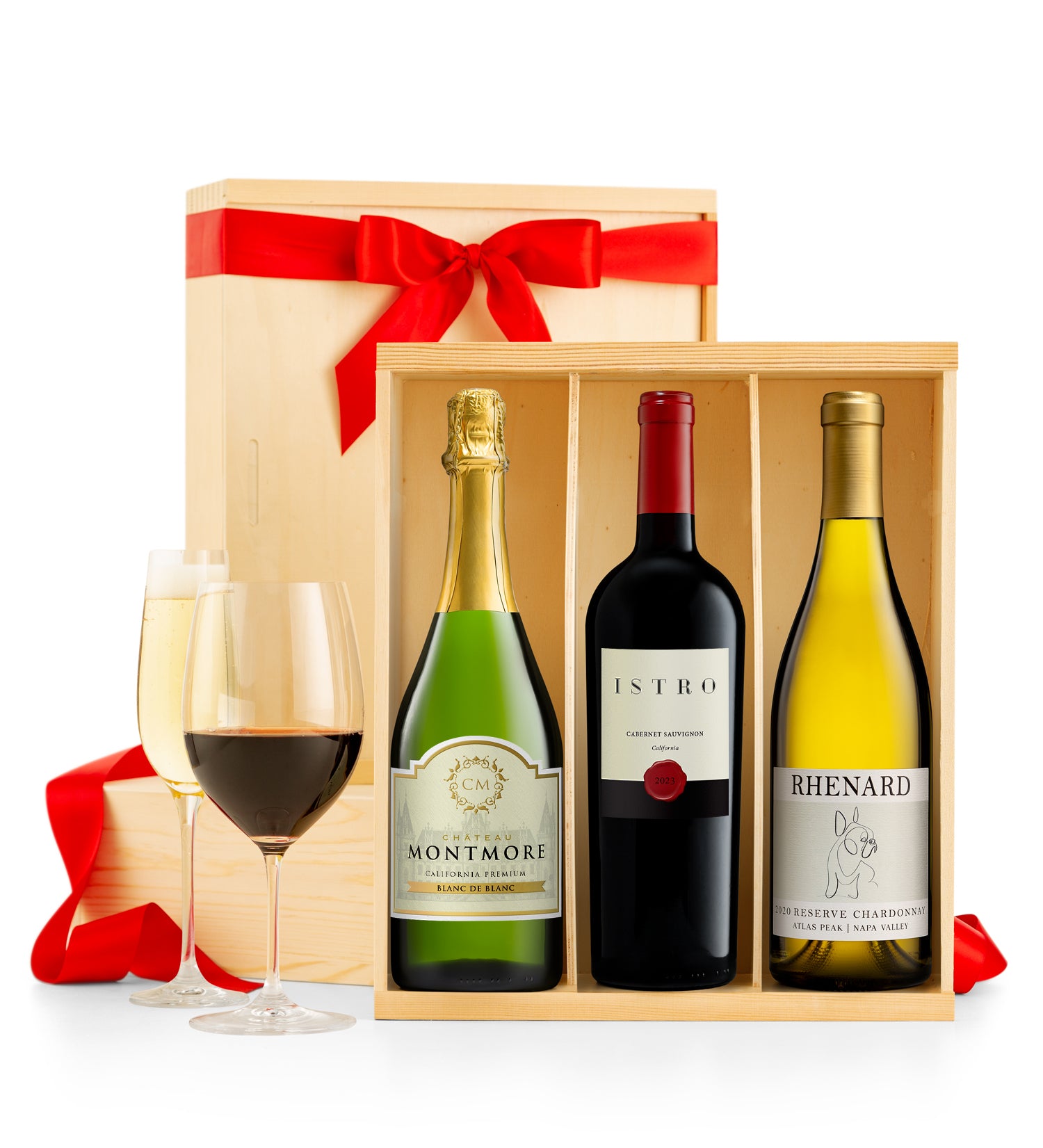 Three wine bottles in a wooden gift box with red ribbons. Bottle of sparkling, red and white.