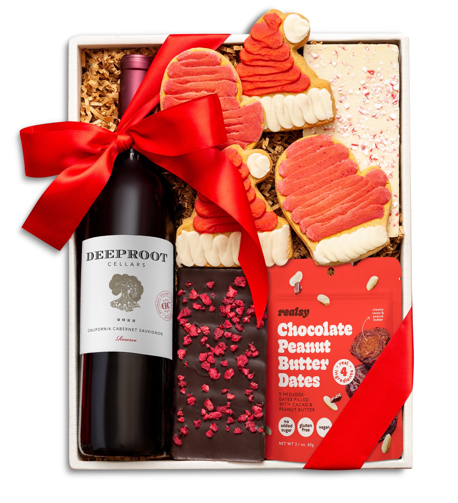 Gift set with Deeproot wine, cookies, and chocolate peanut butter dates on a white background