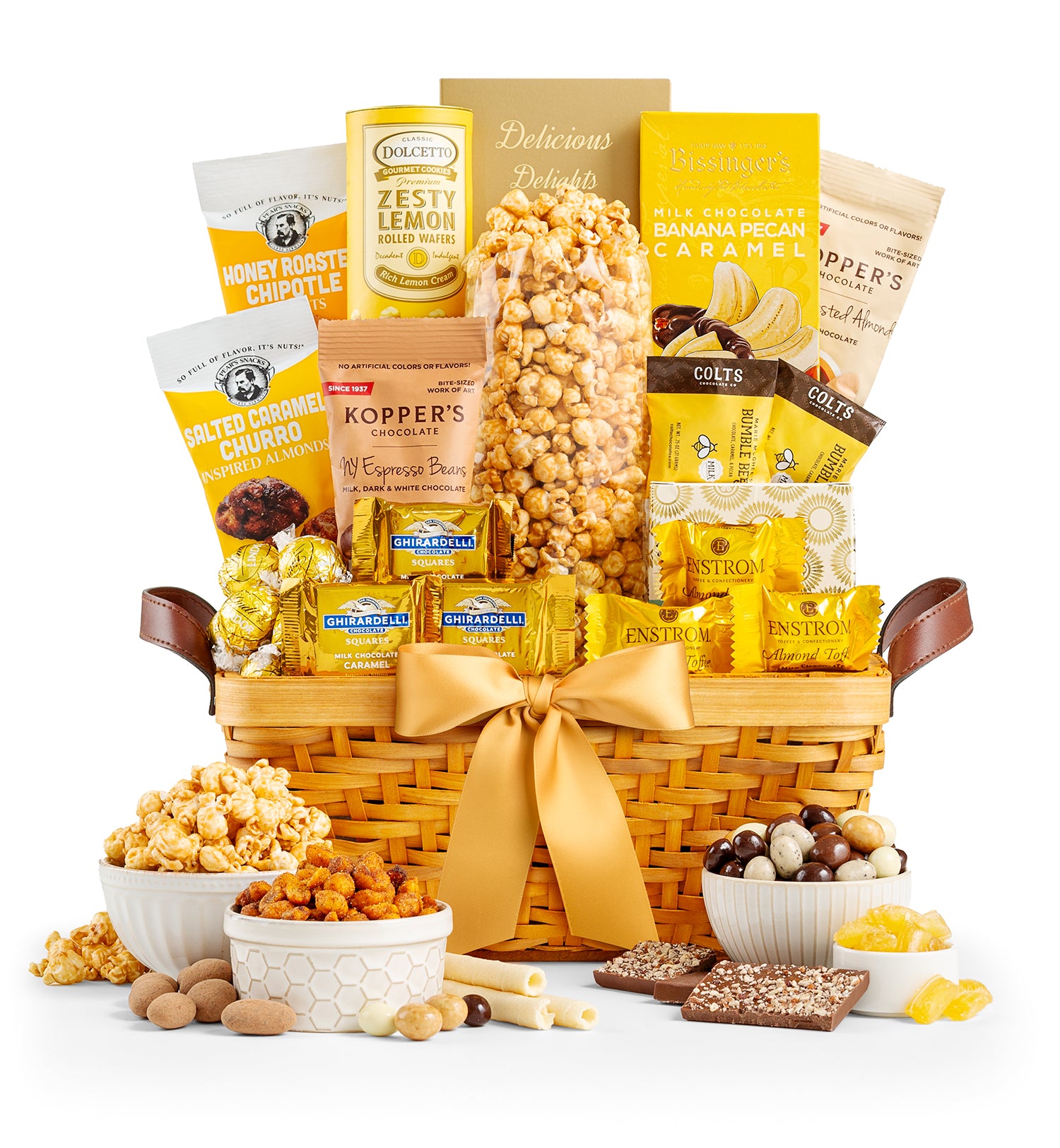 Gourmet gift basket with snacks and treats on a white background