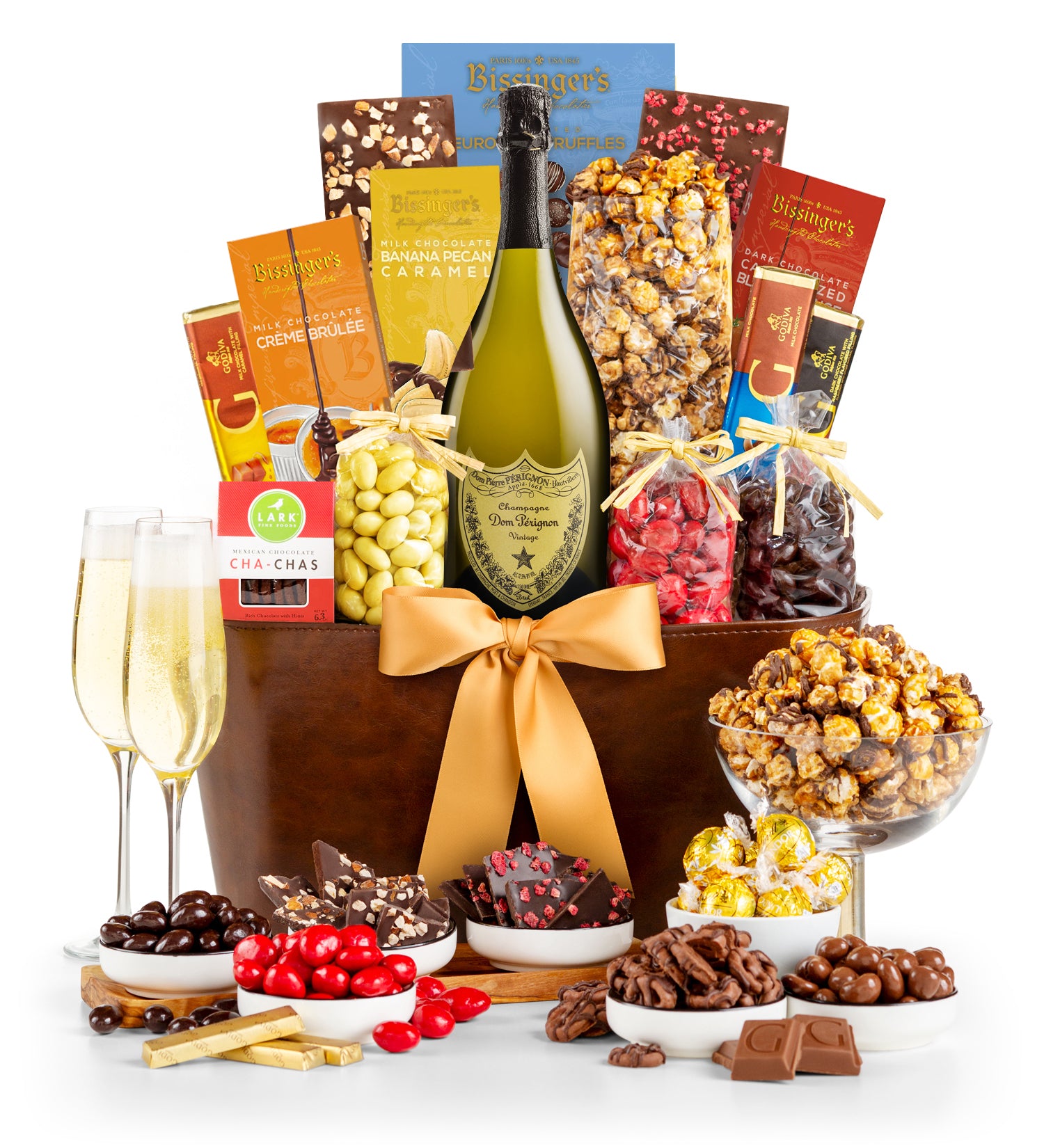 Luxury Dom Pérignon gift basket featuring artisanal gourmet treats, European chocolates and decadent treats.