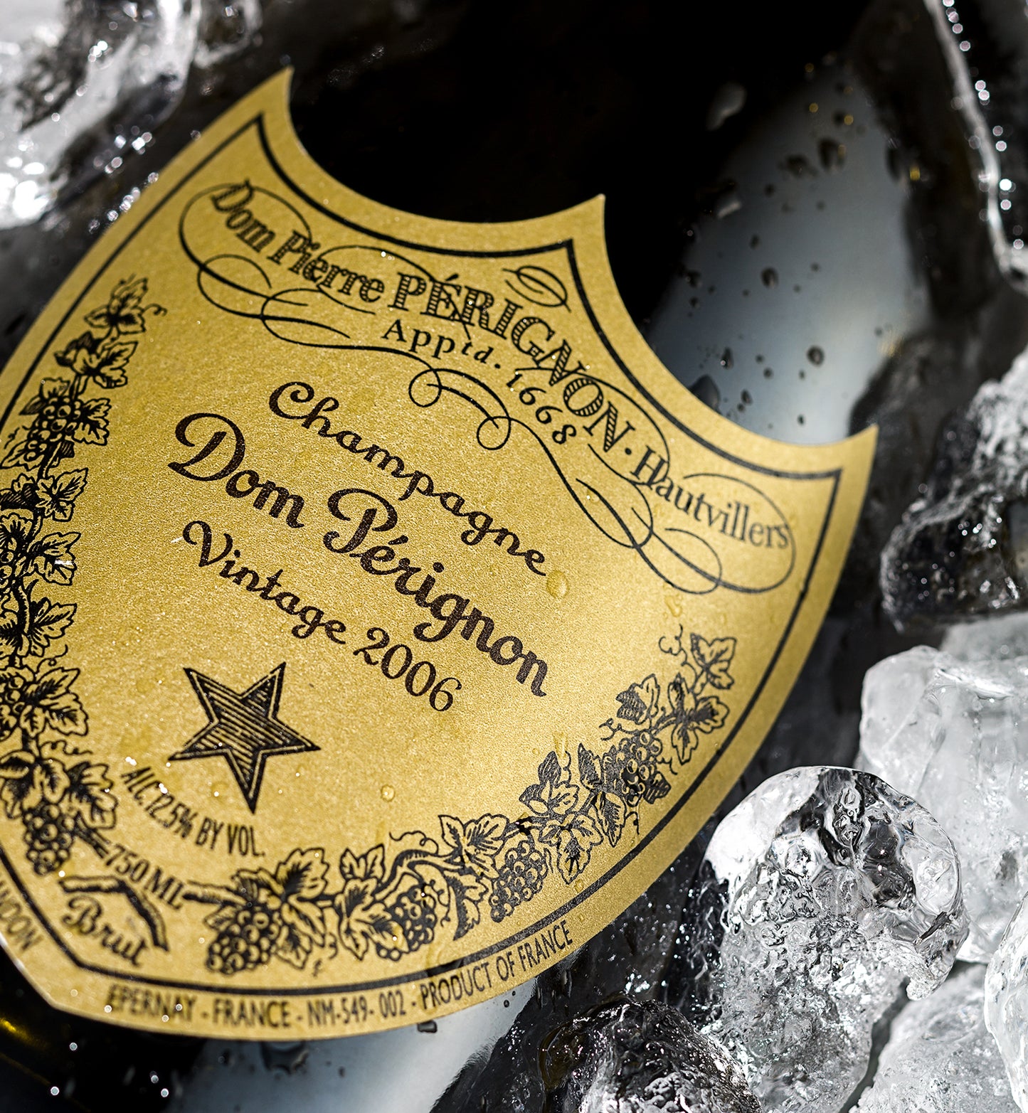 Dom Perignon champagne bottle label on ice