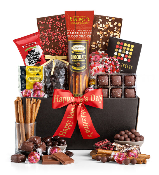 Gourmet gift basket with chocolates, candies, and a 'Happy Valentine's Day' ribbon on a white background.