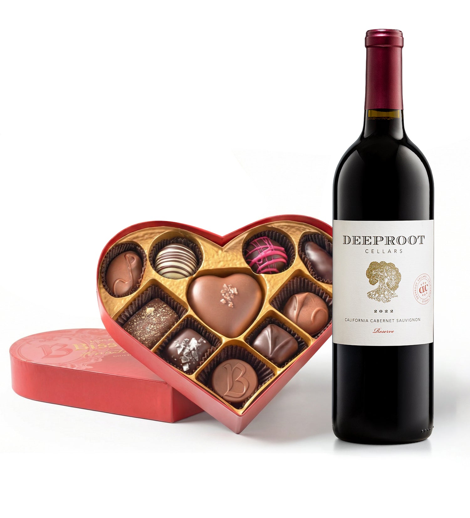 Bottle of Deeproot Cellars wine with a heart-shaped chocolate box on a white background
