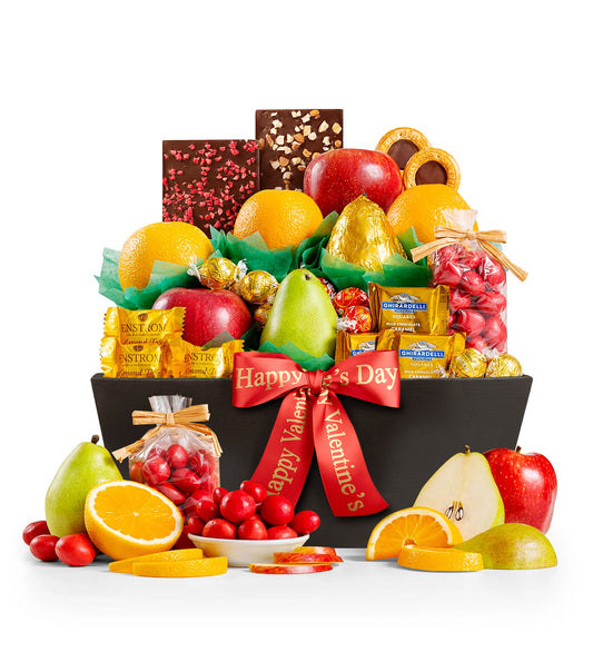Fruit and chocolate gift basket with 'Happy Valentine's Day' ribbon on a white background